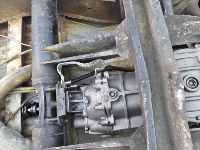 The ground strap on the tranny was clean and tight and tested fine under load.