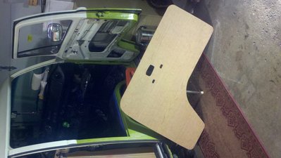 New door cards I cut out of paneling that I will install after I do the body work on the doors