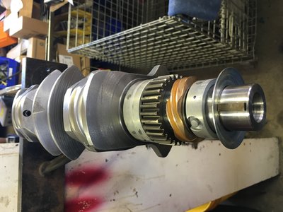 Crank finshed off with bearings, cam and timing gears, and oil slinger.