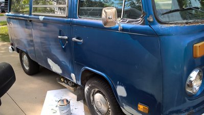 I will have Carlos replace the rusted metal under the windshield, and for now I will cover it again with black tape - or maybe a mac and cheese print for a change. Note to myself: pester Mike enough to teach me how to weld so I can replace bad metal myself, instead of ghettoing it with bondo.